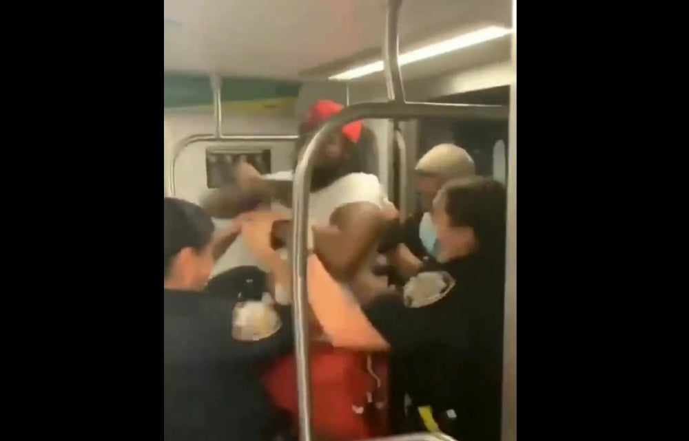 NYPD Officers Swarm and Tase Black Man on Subway After Accusing Him of Letting Someone on Without Paying Fare