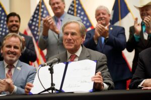 Texas Gov. Greg Abbott Signs Law Creating New Voter Restrictions as Advocates Sue in Federal Court