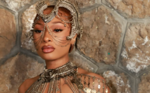 Backward Nails? Social Media is On Fire Over the New Fashion Trend That Megan Thee Stallion Rocked During Paris Fashion Week