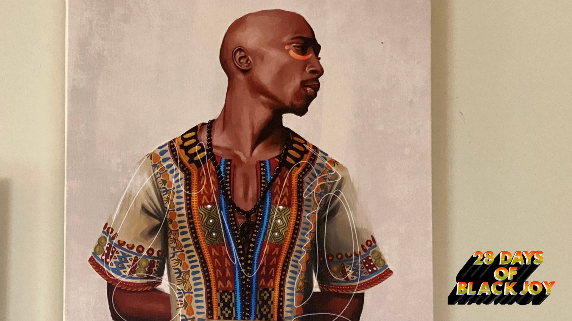 A photo of Chuck Styles 'Tupac BHM' piece on a wall in Panama Jackson's home.