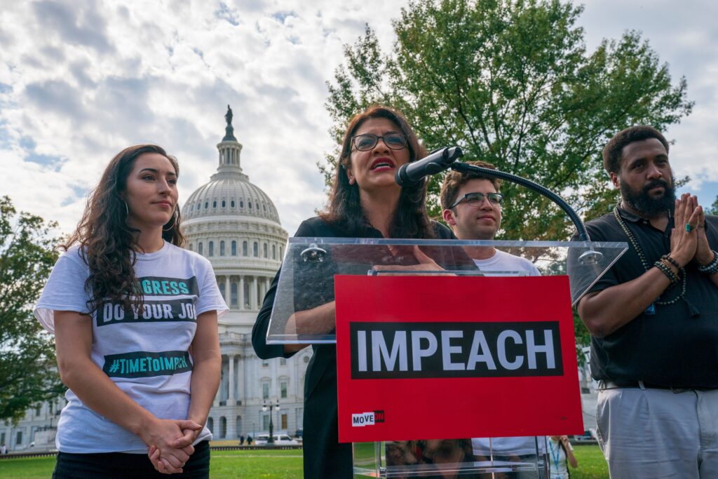 Rep. Rashida Tlaib Stands by Sale of ‘Impeach the MF’ T-Shirts