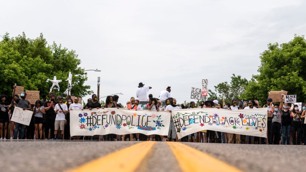 Defund Police vs. #8CantWait Reforms: Differing Calls for Change to Address Police Brutality