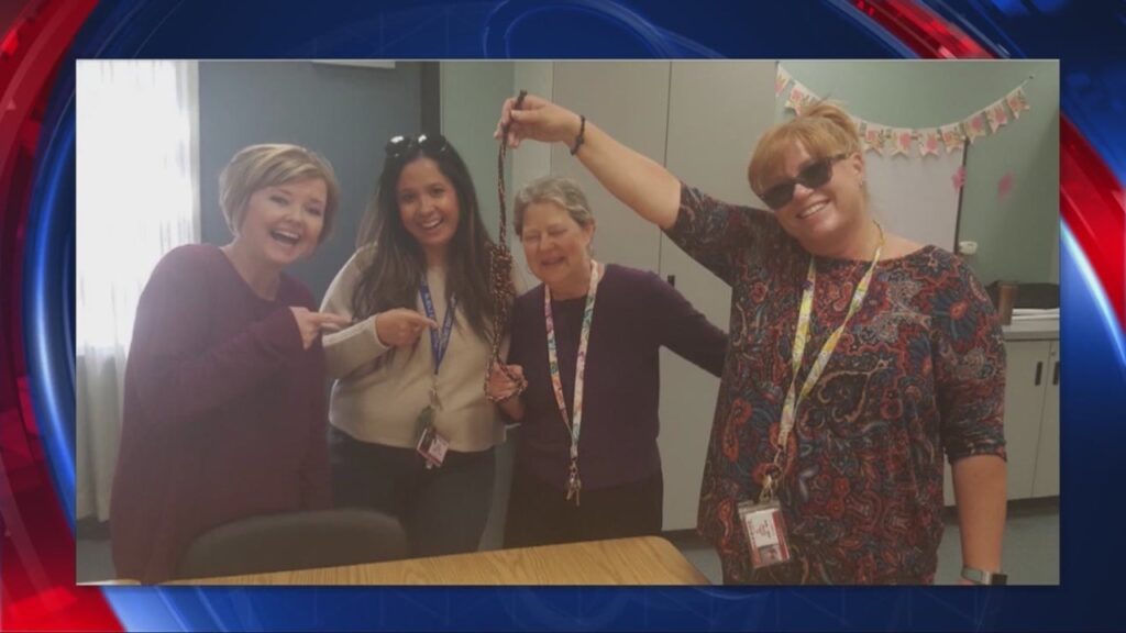 Photos Surface of Teachers at a California School Laughing and Smiling With a Noose in Hand