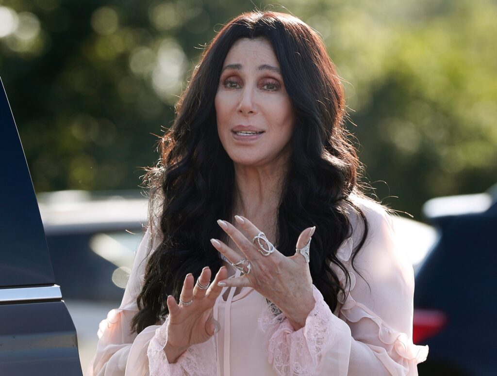 Cher Offers to Pay Legal Fees for Black Security Guard Fired for Telling Student to Stop Calling Him N-Word