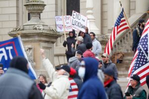 Michigan Residents Stage Gridlock to Protest Stay-At-Home Order